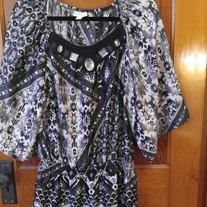 Beautiful silky blouse with sewn in jewels!